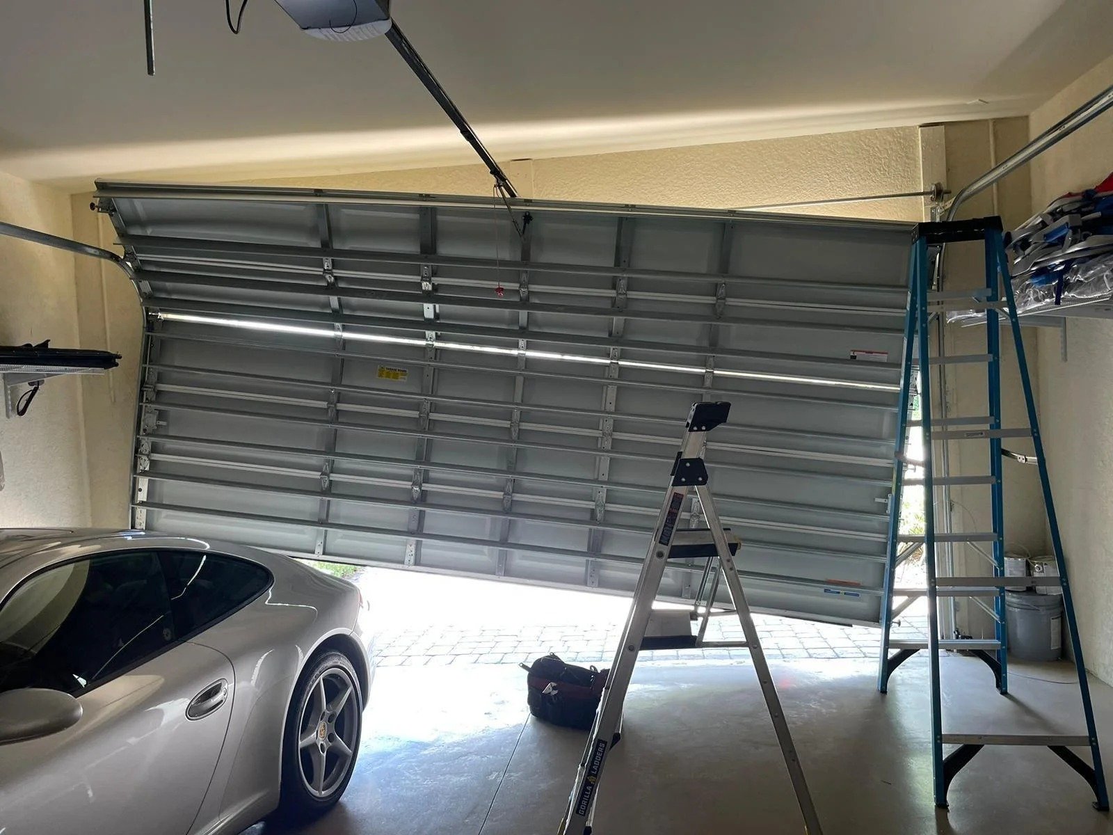 Off-track garage door repair Cumming